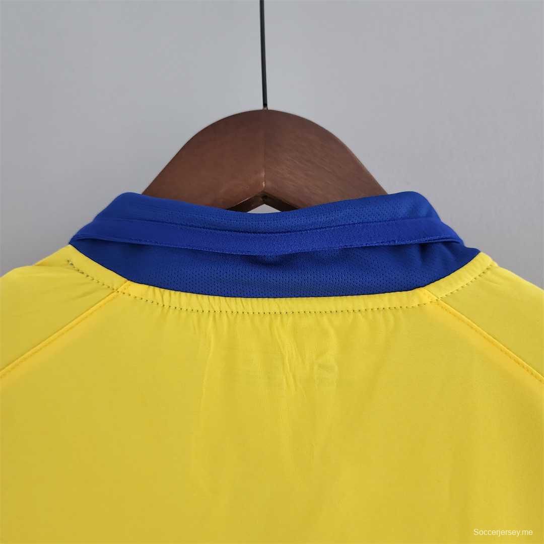 قميص كرة قدم ريترو 03-05 لأرسنال خارج ملعبه
