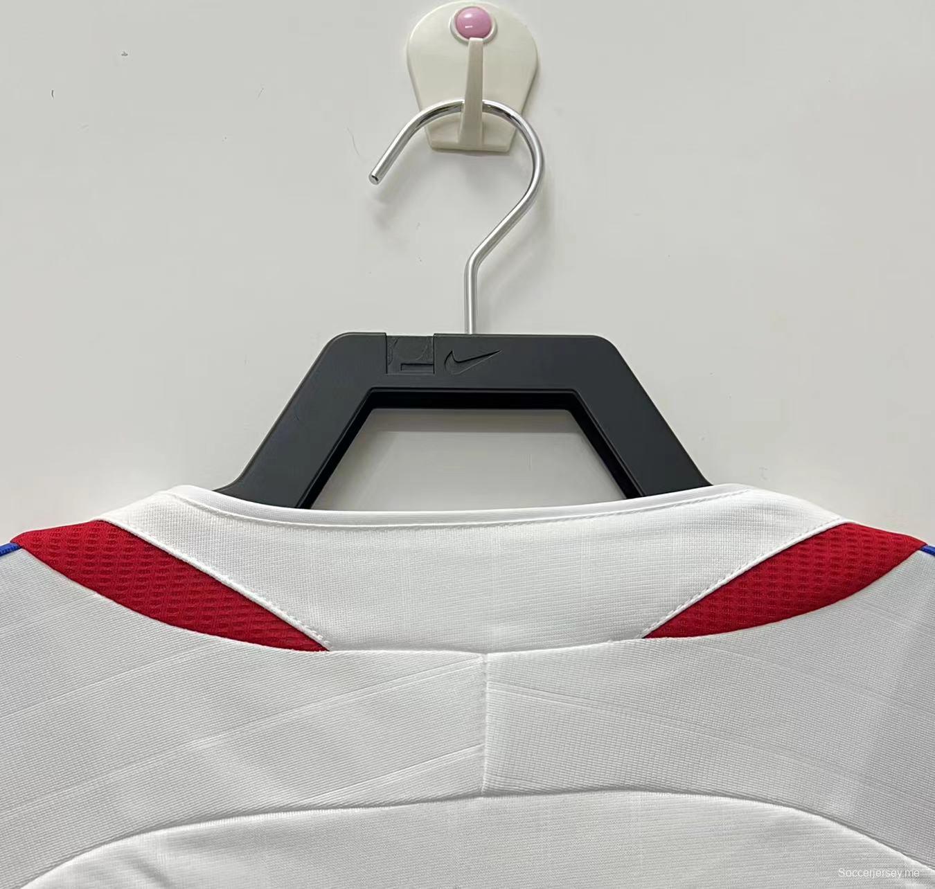 قميص كرة قدم ريترو فرنسا 2006 مع رقعة كأس العالم 06
