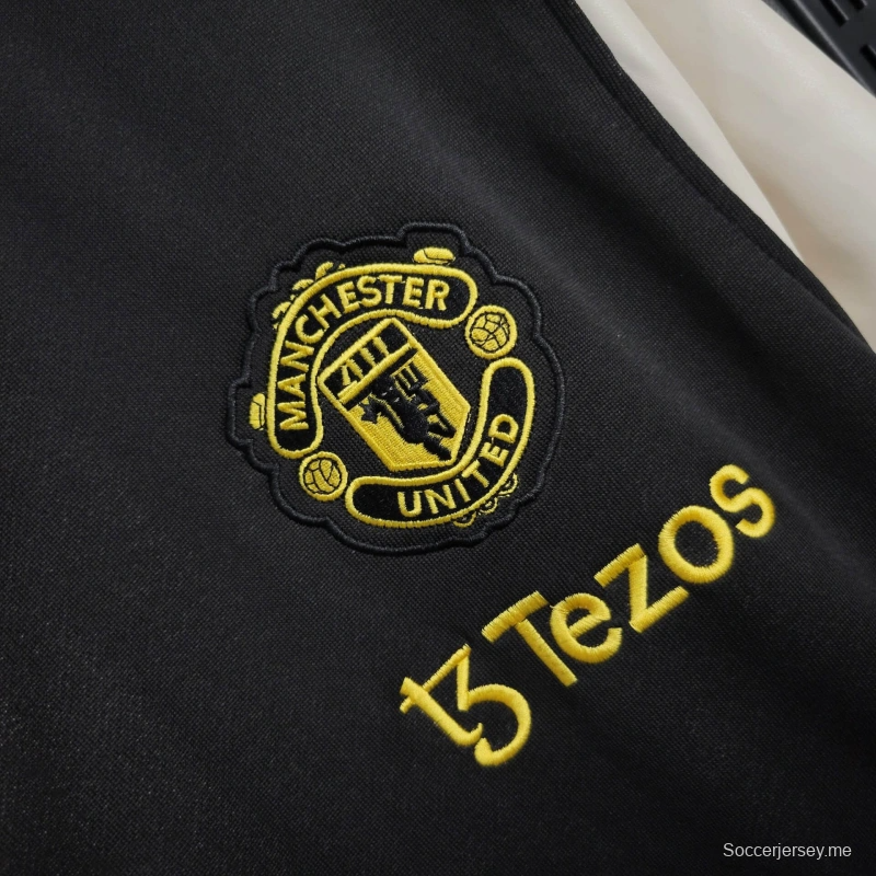 25/26 جاكيت مانشستر يونايتد أسود/سترة واقية من الرياح أبيض/أسود