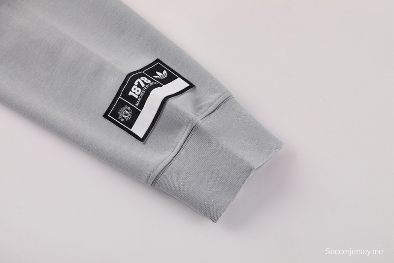 25/26 مانشستر يونايتد جاكيت نصف سحاب رمادي + بنطلون طويل S-2XL