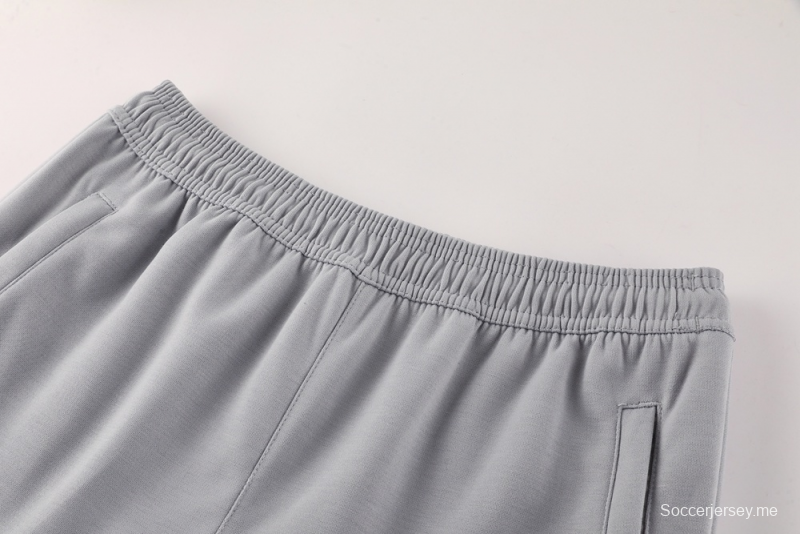 25/26 مانشستر يونايتد جاكيت نصف سحاب رمادي + بنطلون طويل S-2XL