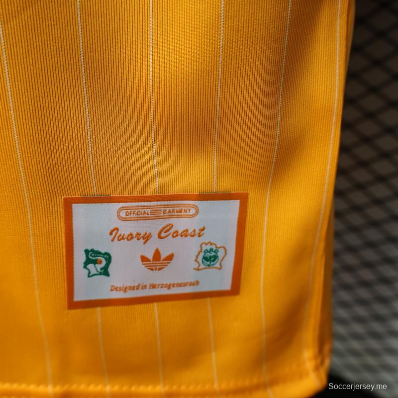 قميص اللاعب الإصدار 2026، كوت ديفوار، شرفة أورانج، أيقونات، أبيض