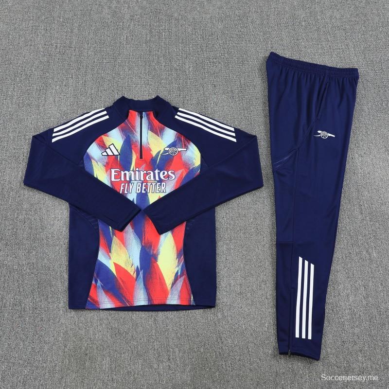 26/27 أرسنال - طقم رياضي باللون الأزرق الداكن بنقشة اللهب، سترة بنصف سحاب + بنطال طويل