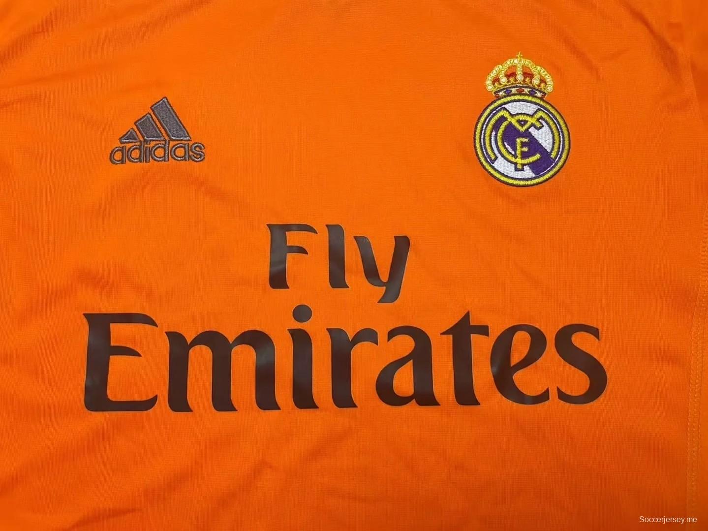 قميص ريترو 13/14 ريال مدريد الثالث برتقالي اللون كان يرتديه رونالدو

